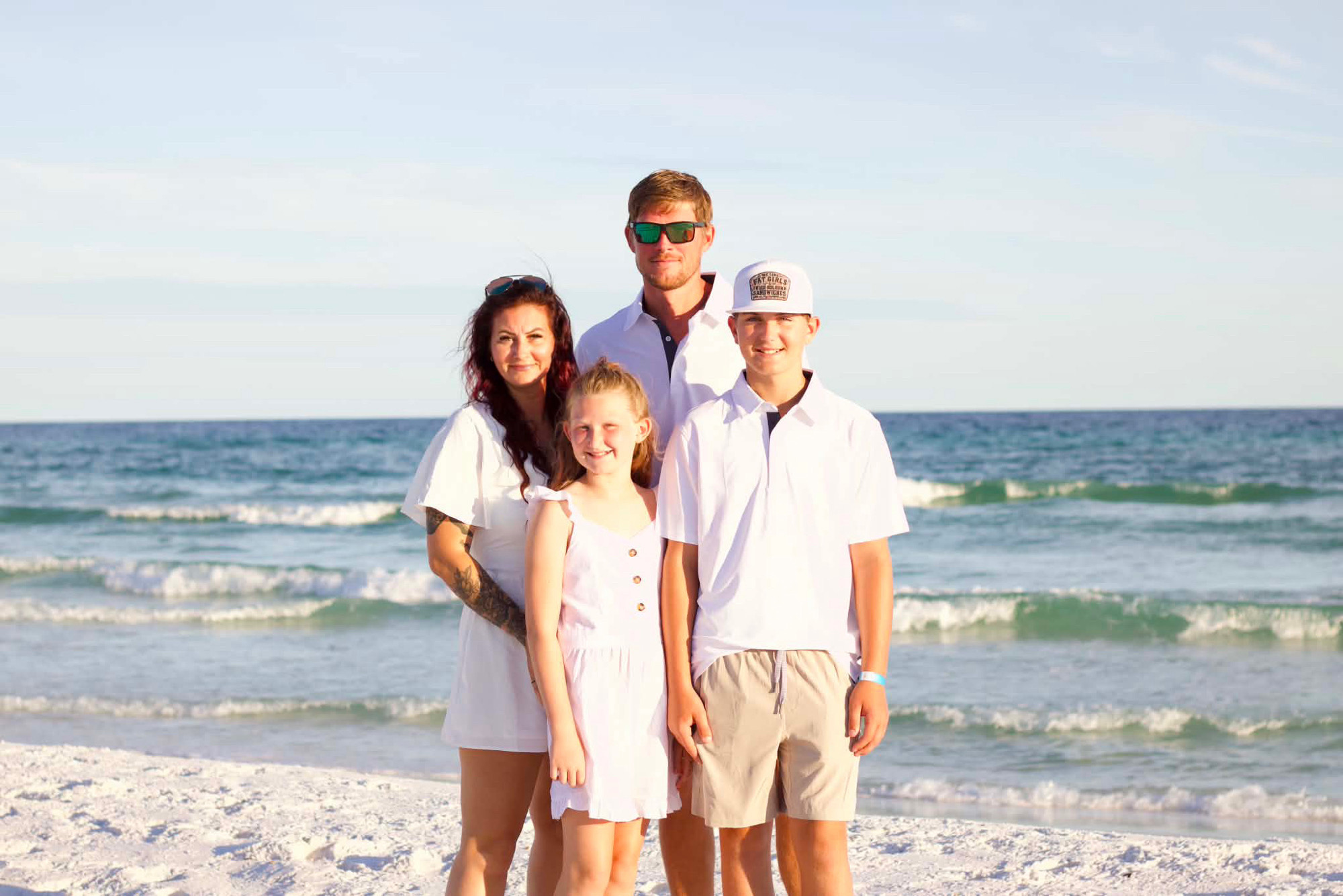 The Matchett family on the beach, the family raising Desert Barbie Schnauzer puppies
